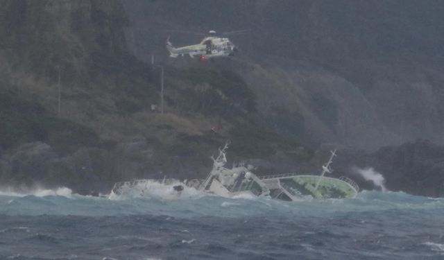 Fishing boat washes up and sinks in rough seas off Japanese island