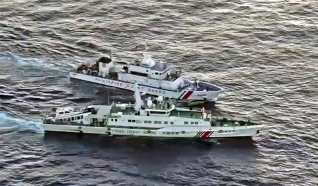 Philippine and Chinese coast guards collide in disputed South China Sea